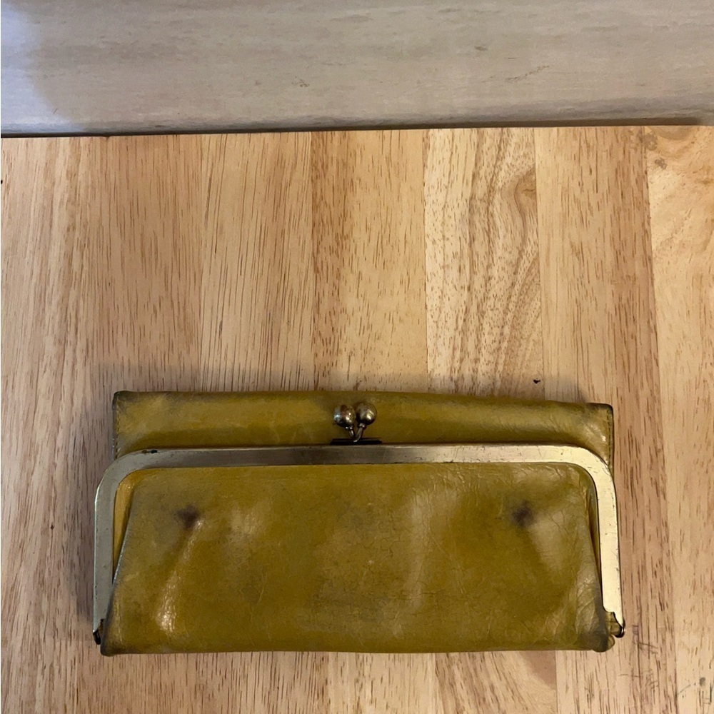 HOBO clutch wallet, recognized for its vintage-inspired frame